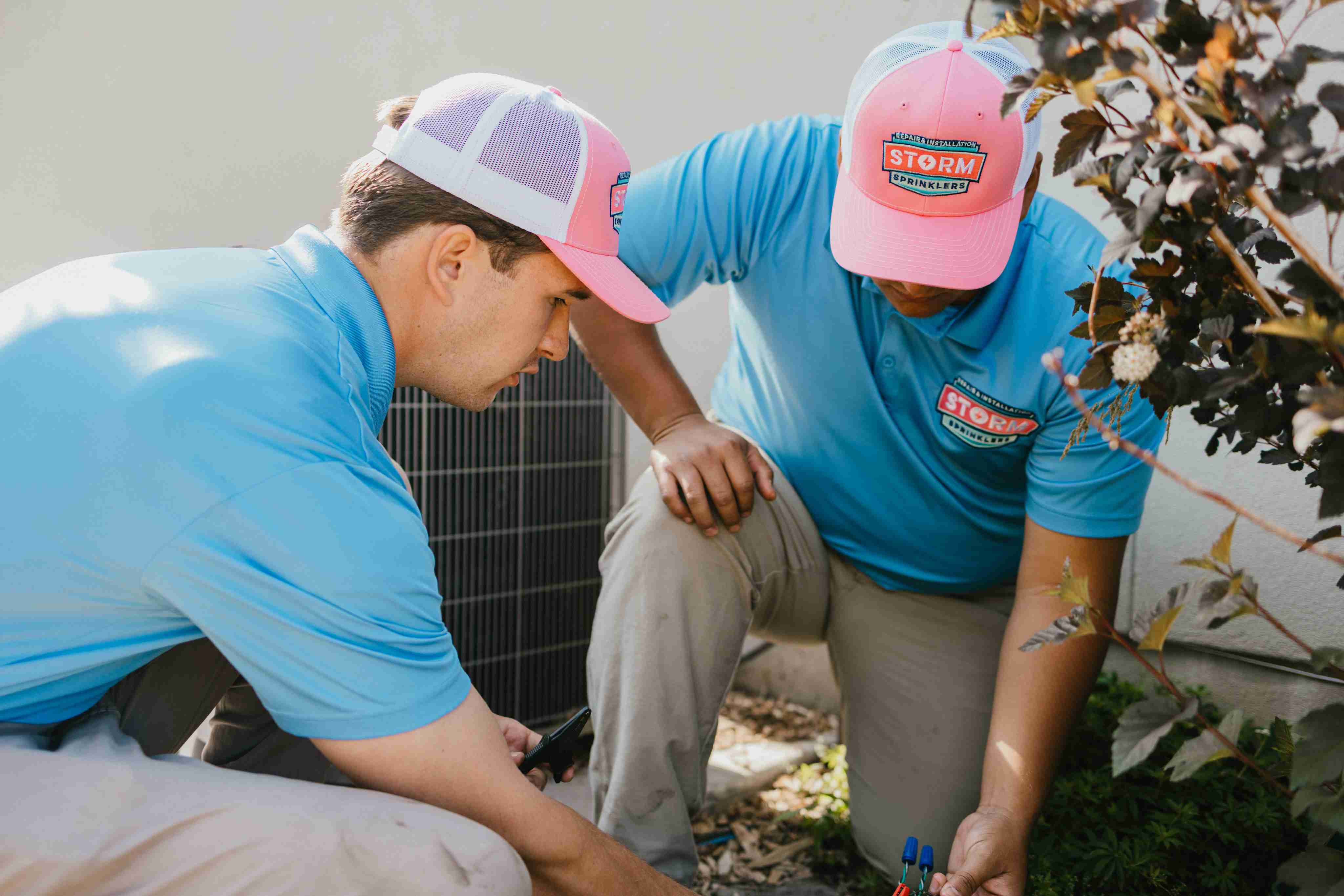 Irrigation install crew member installing a residential sprinkler system in Utah
